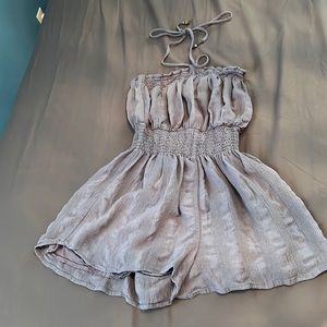 A breezy halter style romper with smocked waist and neckline from Forever 21.